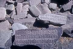 Mani stones in Khalsi, carved with the six syllabled mantra of Avalokiteshvara “Om mani padme hum”, as a form of prayer in Tibetan Buddhism.