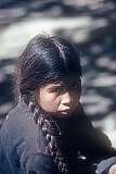A Ladakhi girl, with hair braids, in Khalsi.