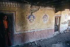 Dilapidated murals on the wall in Leh Palace.