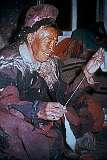 Grandmother Ishe Kuzum spinning wool.