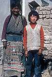 Tsering Dhondup (12) and his mother, in front of their home in the Tibetan Refugee Settlement in Choglamsar.