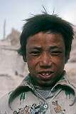 A boy in Shey, four kilometres northwest of Thikse and 15 kilometres southeast from Leh.