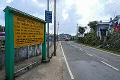 Sign in the Khasi language, at the village of Nongthymmai, along the Sohra-Shella road, south of Sohra (Cherrapunji).
