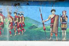 Naga costumes and culture in a wall painting at the along the road in Kohima.