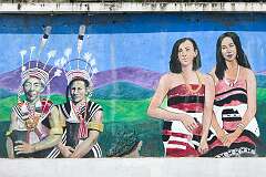 Wall painting depicting Naga costumes and culture at the Local Ground along the road leading south out of Kohima.