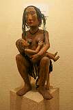 A wooden statue of a mother and child, by Konyak Naga people, in the Nagaland State Museum, Kohima.
