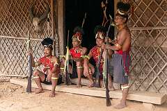 Manchon, Pango, Lokom and Taigung, Konyak Naga men in traditional attire at Tonyei Ahng's house.