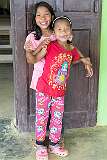 Two young Konyak Naga girls of Sheanghah Chingnyu.