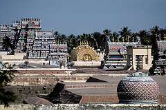 The carved roofs and the golden cupola over the inner sanctum of the Sri Rangathaswamy Temple, also known as Periyakovil (Big Temple), Bhooloka Vaikuntam, and Srirangam Tirupati.