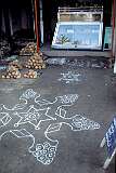 A “Kolam”, a traditional rice-paste design in front of a shop in Srirangam.