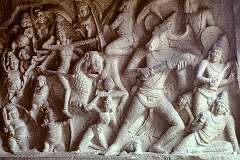 A sculpture on the wall of a shallow cave in Mahishamardini Mandapam, Mahabalipuram.