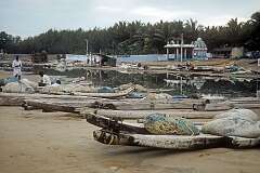 Log boats on the beach in a village near Mahabalipuram.