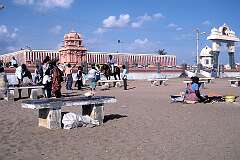 The red and white painted wall around the Kanniya Kumari Amman Temple on the shore of Cape Comorin, the southernmost point of India.