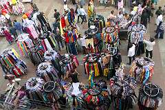 Clothing stalls,  on the market in Charminar Road.