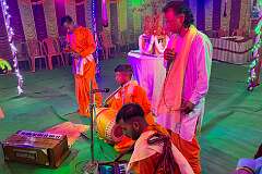 Religious music in a Hindu “puja” ceremony to honour a recently deceased guru, in a temporary temple, Agartala.