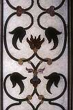 Marble inlay on a wall of the Taj Mahal, the magnificent marble mausoleum on the right bank of the river Yamuna in Agra.