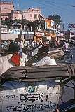 A cycle rickshaw on a square in Varanasi.