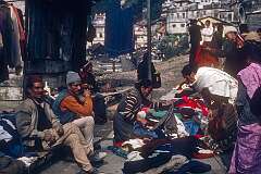 Selling clothes on a market in Darjeeling.