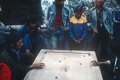Playing a game on a Darjeeling street.
