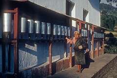 Buddhist prayer wheels at the Bhutanese Jangsa Gompa, a Nyingmapa-school monastery, founded in 1678; the present main building, built in the 19th century, is surrounded by 220 small prayer wheels.