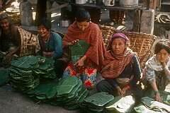 Selling packets in palm leaves at Raja Dorjee Market in Kalimpong.