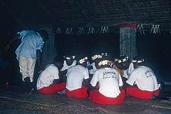 Men singing, in Nauru T-shirts, Tabwiroa School.
