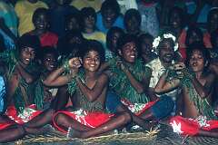 Boys performing a “sit-down” dance at a school party in Tabwiroa.