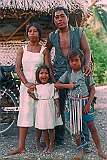 Marlyna and Snappy Arawatau with their children Rita and Frenny in front of their house in Tuarabu.