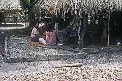 A family at their home in Kabangaki village.