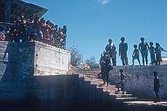 People waving goodbye from the harbour in Uma (Umwa) on Banaba
