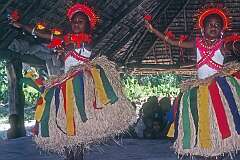 Girls performing traditional Gilbertese dancing in the Maneaba “Te Aake” in Ukiangang.