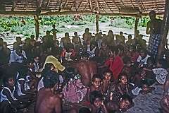 The men singing in the Maneaba “Te Aake”, the meeting house in the village of Ukiangang.