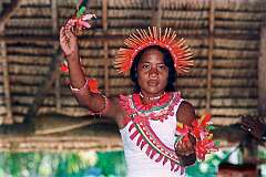A girl performing traditional Gilbertese dancing in the Maneaba “Te Aake”,  Ukiangang.
