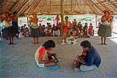 Gilbertese dancing with music on a small keyboard and guitar.