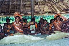 Men performing a traditional Gilbertese “sit-down” dance in the maneaba “Te Aake” on Butaritari