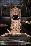 A Kiribati armour set, displayed in the Australian Museum in Sydney, Australia. It is made from coconut fibre, hair, seeds, shark teeth and wood and dates to the late 1880s. Kiribati armour is the most sophisticated form of traditional body protection in the Pacific, strong enough to deflect spears, shark-tooth weapons, and even European knives and bayonets. It includes a wicker helmet, a back plate, gauntlets and a shark-tooth sword or lacerator: making an armoured Kiribati warrior a formidable and intimidating sight.