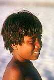 A young boy on the beach in Betio.