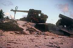 Cannons remaining from the Battle of Tarawa that was fought here during the Second World War, in Betio.