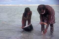 A fisherman and his daughter on Abatao islet.