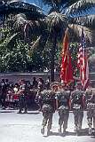 American Marines marching with their flags, at the ceremony commemorating the 45th anniversary of the Battle of Tarawa in Betio.