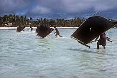 Racing model canoes in the lagoon of Tabiteuea, a small islet of North Tarawa.