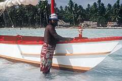 Pepetake with his canoe on Nabeina, a small islet of North Tarawa.