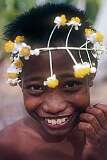 A boy wearing a flower garland in Buariki.