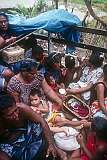 Passengers on the truck from Buariki, the northernmost village, to South Tarawa, driving between the islets of the atoll at low tide.