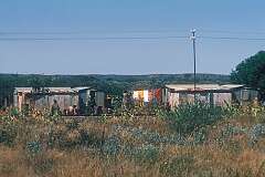 Tin houses of Herero people along the railway, between Otjiwaringo and Otavi, in the north of Namibia.