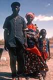 A Damara family in Otavi (Otjitavi), 360 kilometres north of Windhoek. The Damaran (in Khoekhoegowab, the Khoekhoe language, called ǂNūkhoen, Black people) make up 8.5% of Namibia's population.