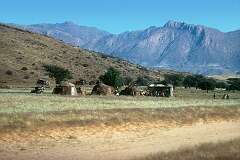 Damara huts along the road to Uis, at the foot of Brandberg Mountain.
