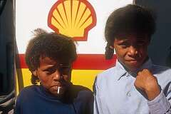 Two boys at the petrol pump in Gochas, a village in the Hardap region.