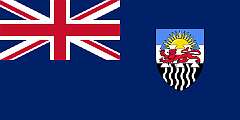 FEDERATION OF RHODESIA AND NYASALAND, 1953 - On 1 August 1953, the self-governing British colony of Southern Rhodesia, along with the British protectorates of Northern Rhodesia (now Zambia) and Nyasaland (now Malawi), were federated into what was also known as the Central African Federation. Its flag was a defaced Blue Ensign with in the fly the shield from the Federation’s coat of arms. The rising sun is from the colonial arms of Nyasaland, the red lion passant is from the arms of Southern Rhodesia, and the black and white wavy lines are from the arms of Northern Rhodesia.